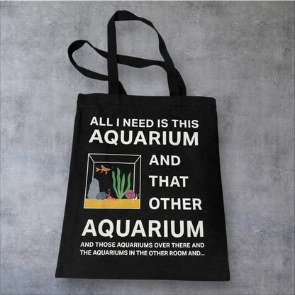 Black tote bag with an aquarium-themed graphic.