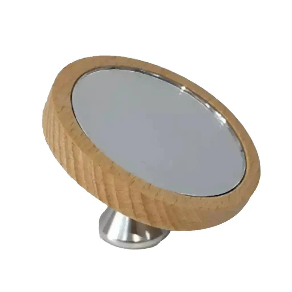 Round wooden-framed mirror with metal stand.