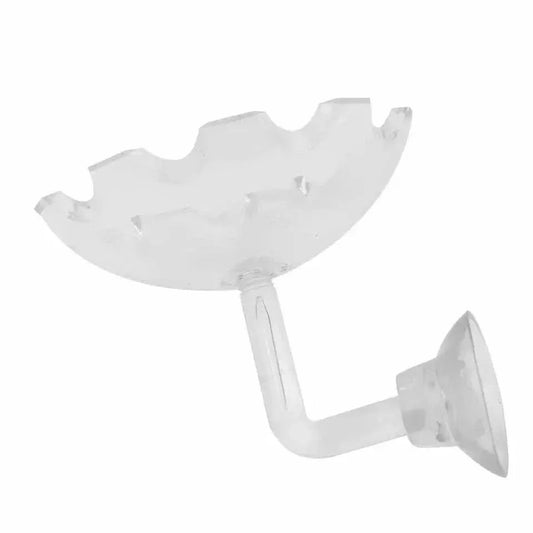 Clear plastic toothbrush holder with suction cup.
