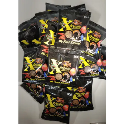 Packets of Xtreme fish food.