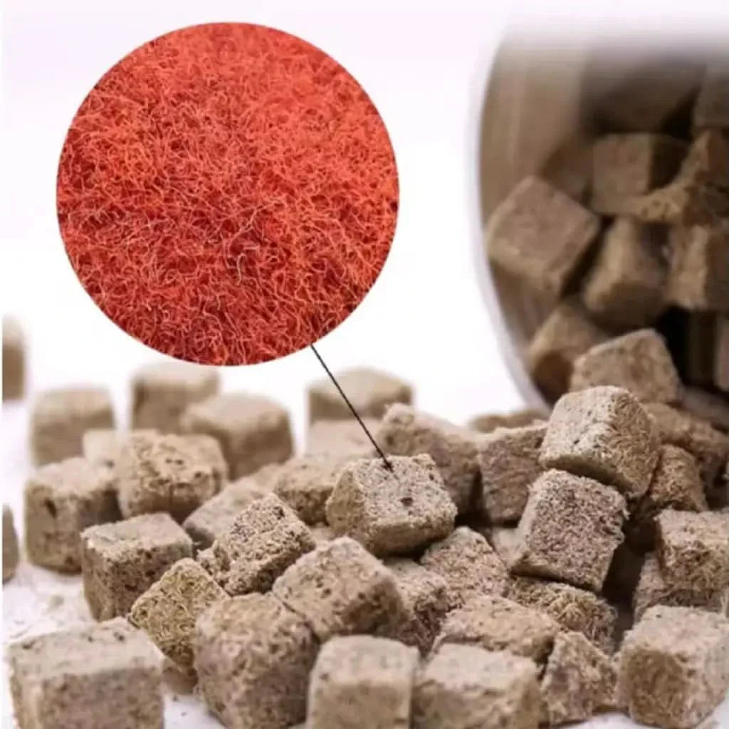 Square, brown, porous food cubes.