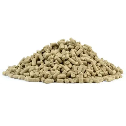 Pile of cylindrical animal feed pellets.