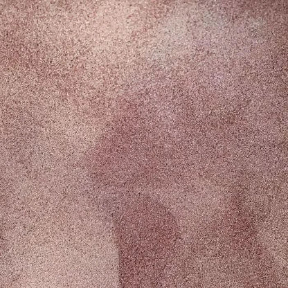 Textured mauve suede.