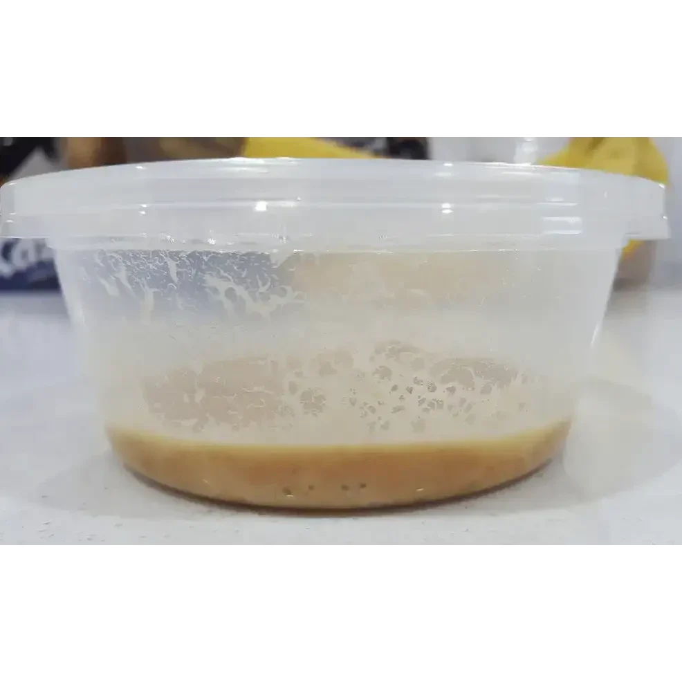 Plastic container with liquid.