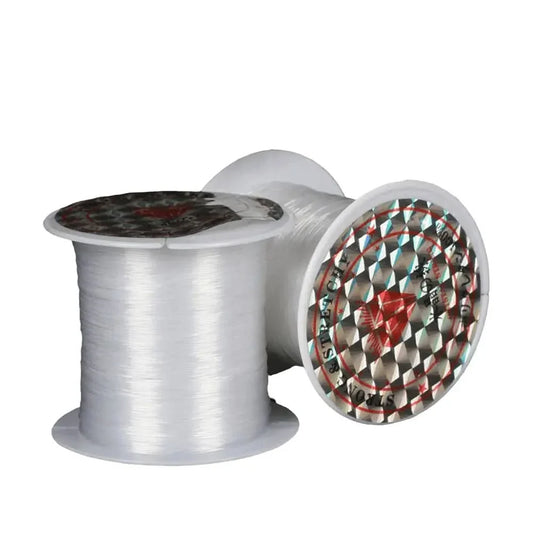 Spools of clear, stretchy thread.