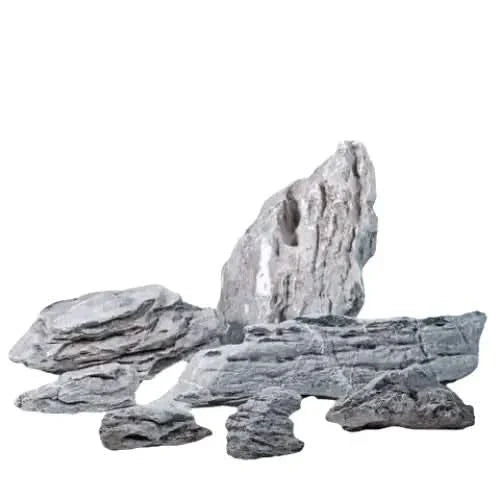 Collection of gray, layered rocks.