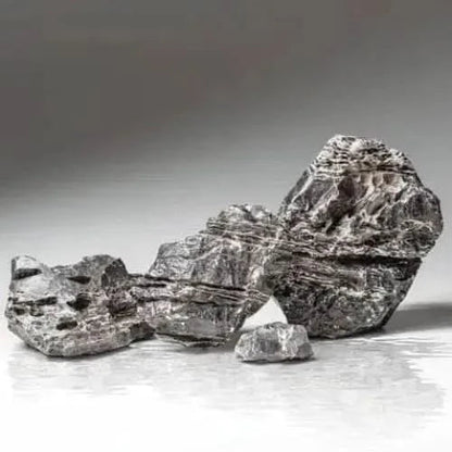 Layered, gray rocks.