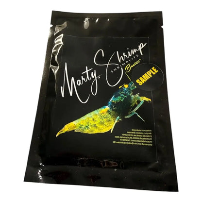 Black foil pouch of shrimp food with a yellow shrimp graphic.