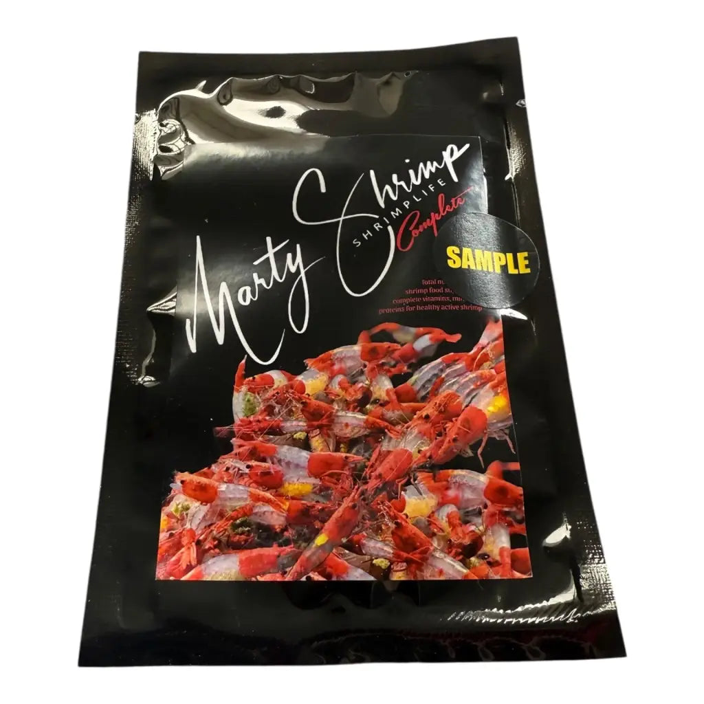 Black pouch of shrimp food with a sample label.