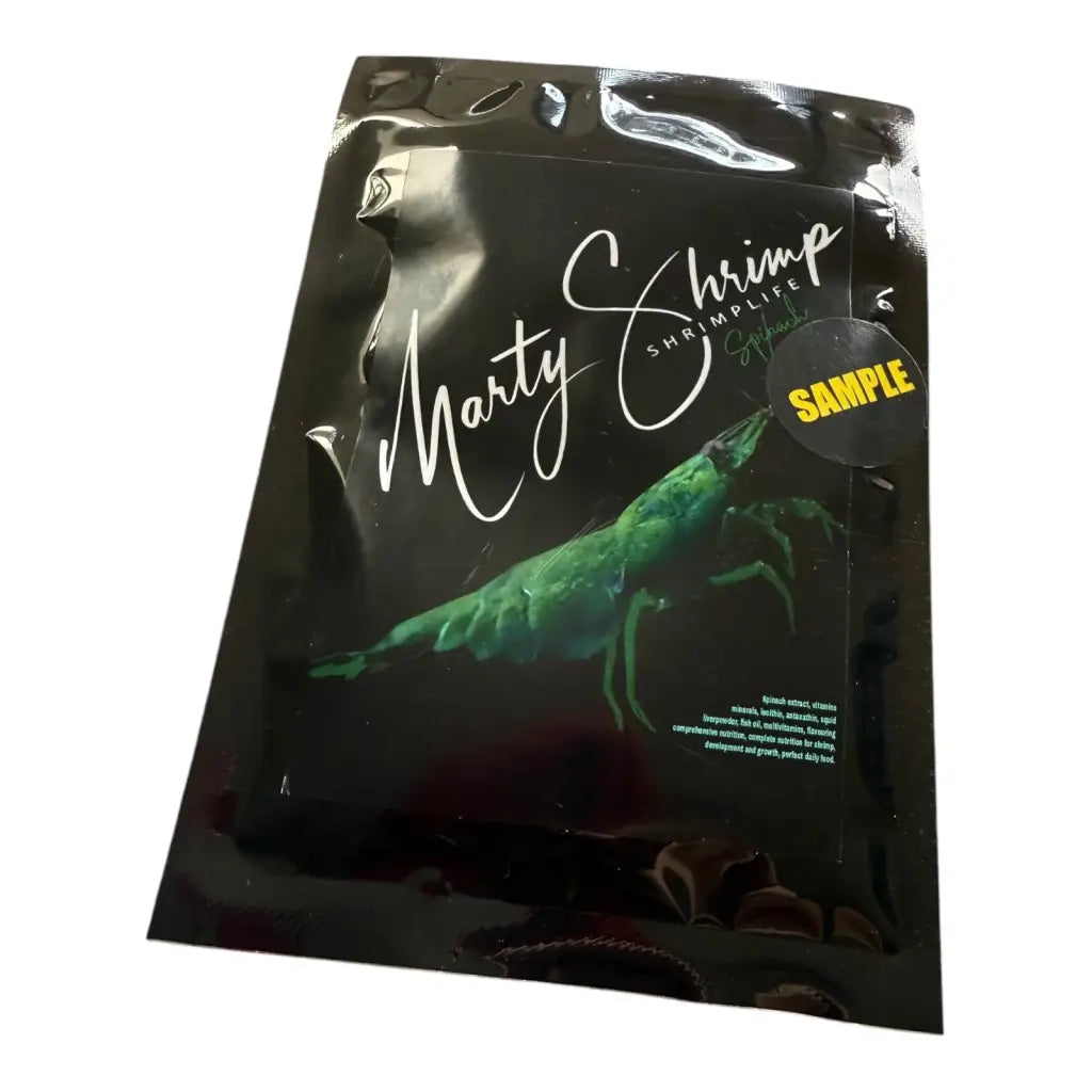 Black pouch of shrimp food with a green shrimp graphic