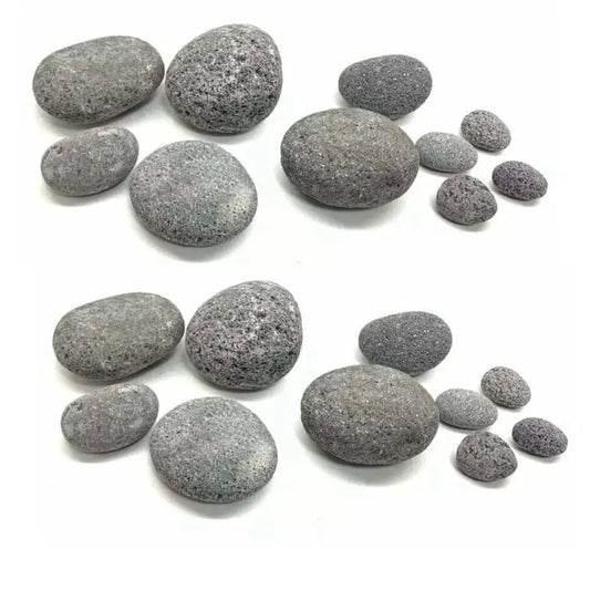 A collection of smooth, gray, porous lava rocks.