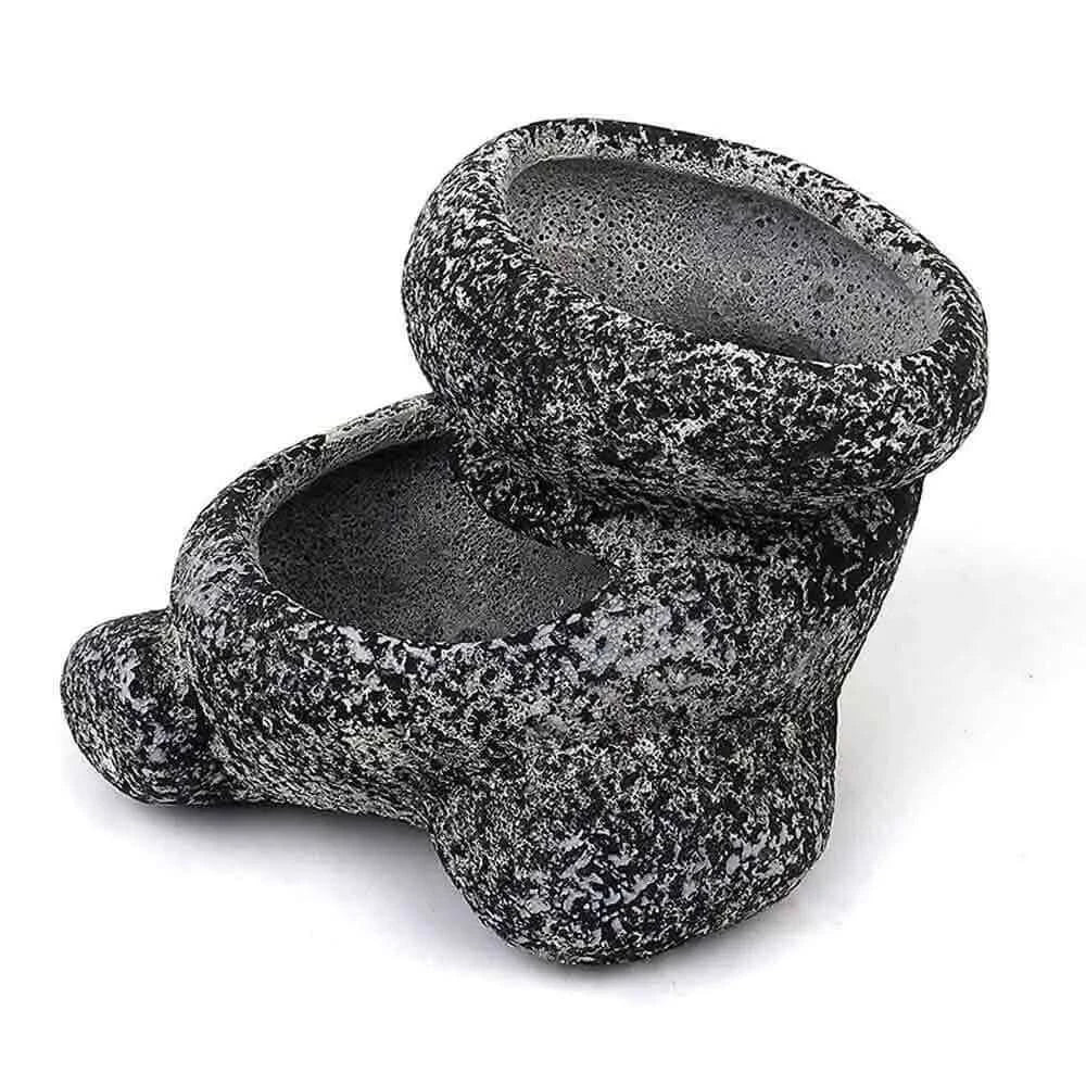 Two-tiered stone-textured planter.