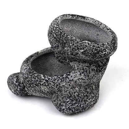 Two-tiered stone-textured planter.