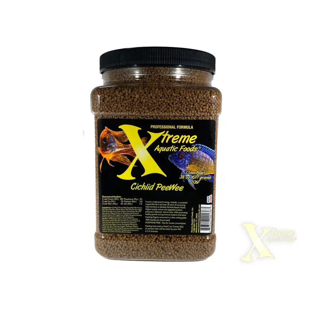 Container of cichlid fish food.