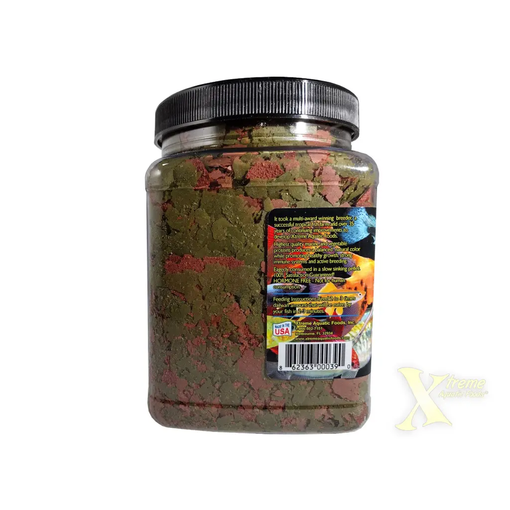Container of fish food flakes.