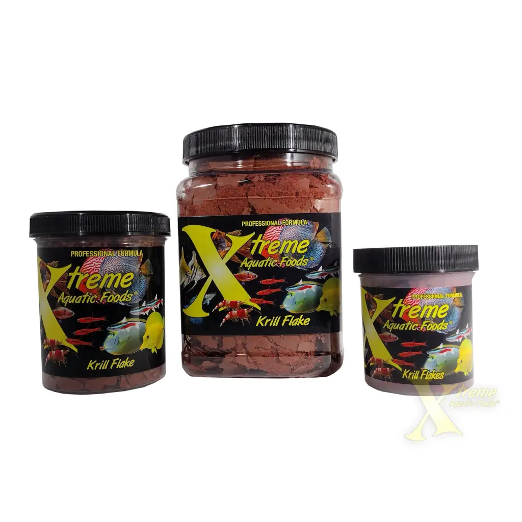 Three containers of krill flake fish food.