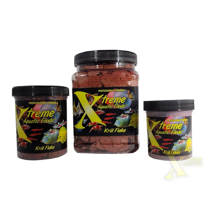 Three containers of krill flake fish food.