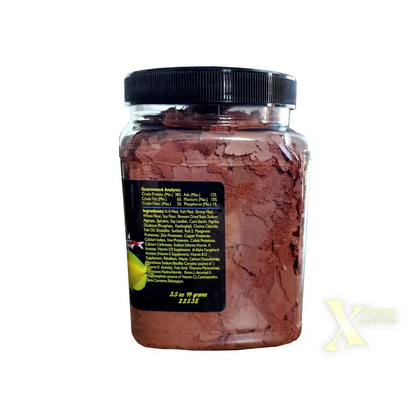 Container of fish food flakes.
