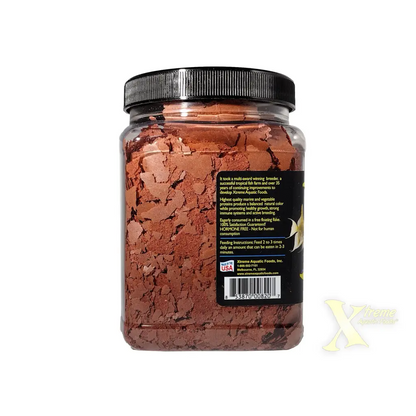 Container of fish food flakes.