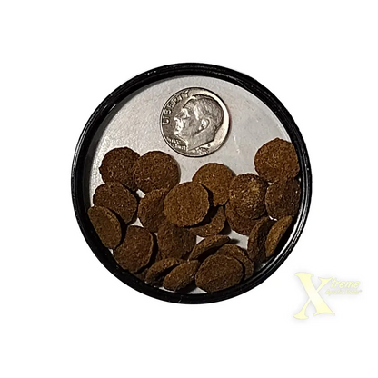 Round brown fish food pellets.