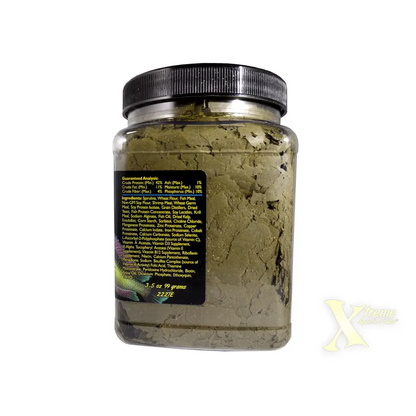 Container of green fish food flakes.